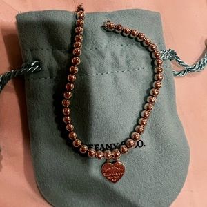 Authentic Tiffany and Co silver beaded bracelet with heart charm, size small